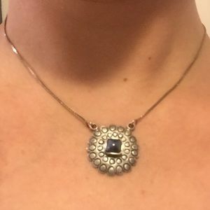 Sterling silver necklace with blue stone